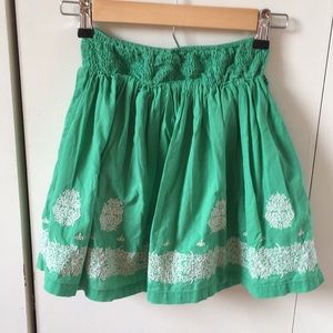Green skirt extra small with white embroidery.